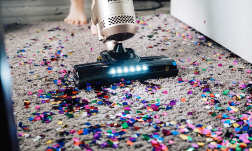 image of vacuum cleaning up confetti