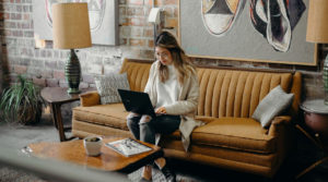 woman sitting on couch