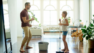 dad and daughter cleaning