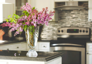 lilacs on the counter in the kitchen