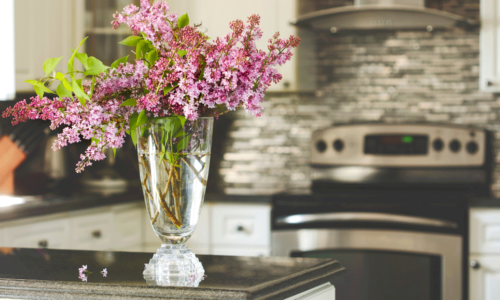 lilacs on the counter in the kitchen